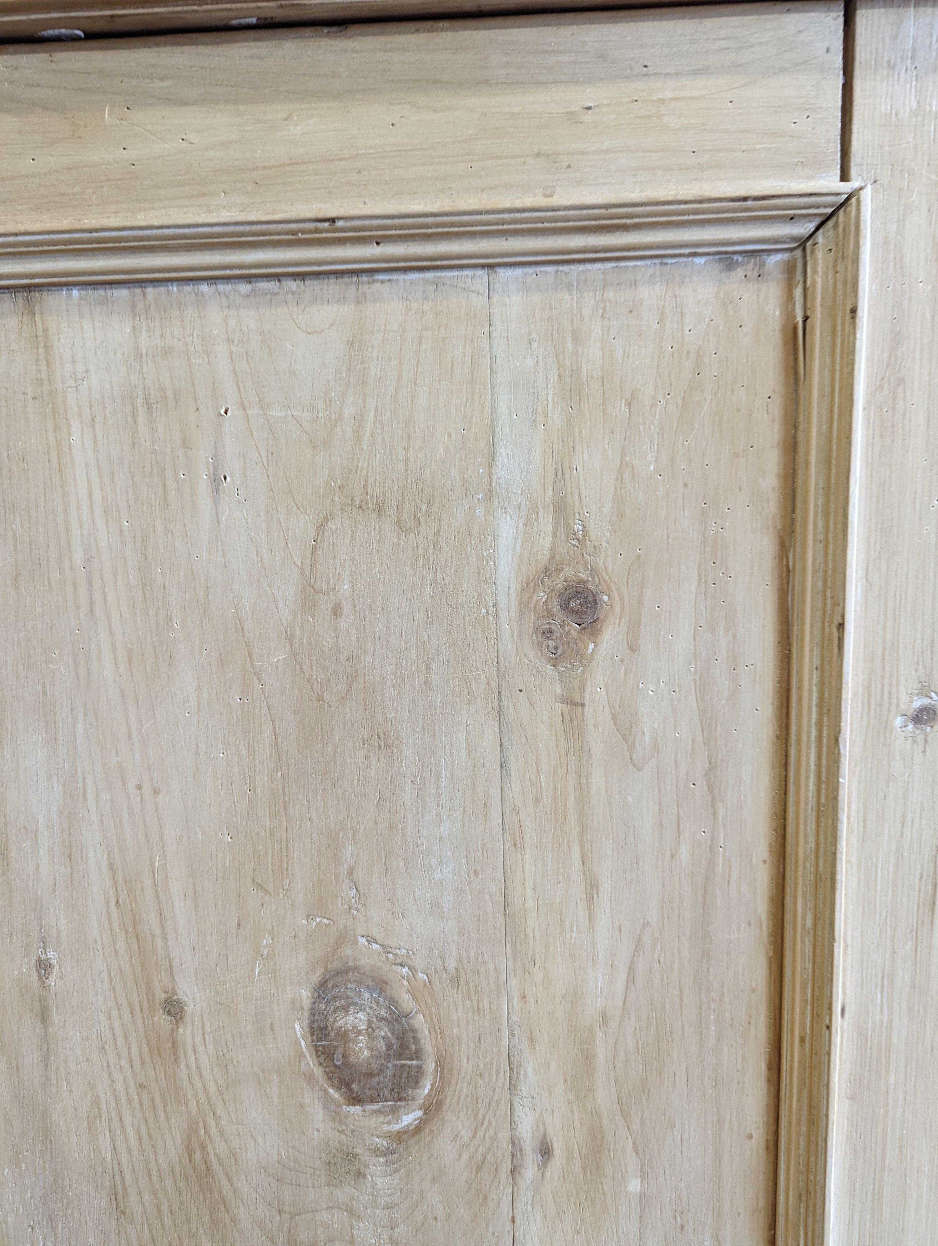 An Edwardian pine kitchen cupboard with five drawer base, width 94cm, height 193cm